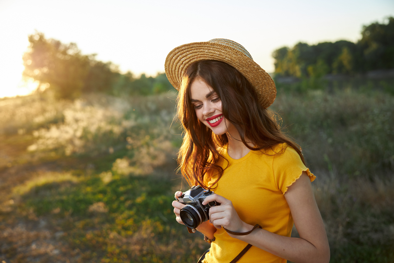 Cheerful Woman in Nature with a Camera Leisure Hobby Lifestyle