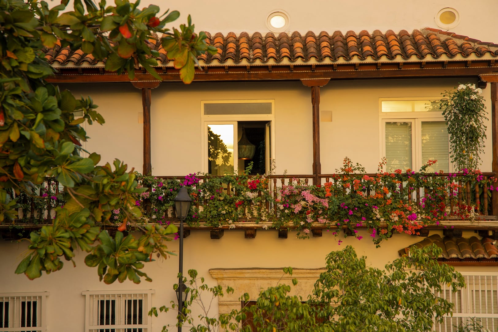 Traditional Building with Wooden Balcony and Flowers
